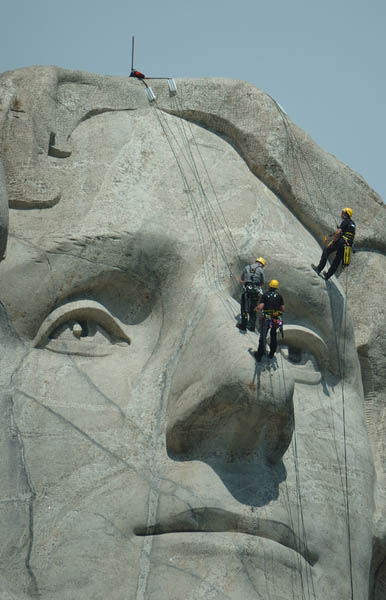 Climbers on Mount Rushmore